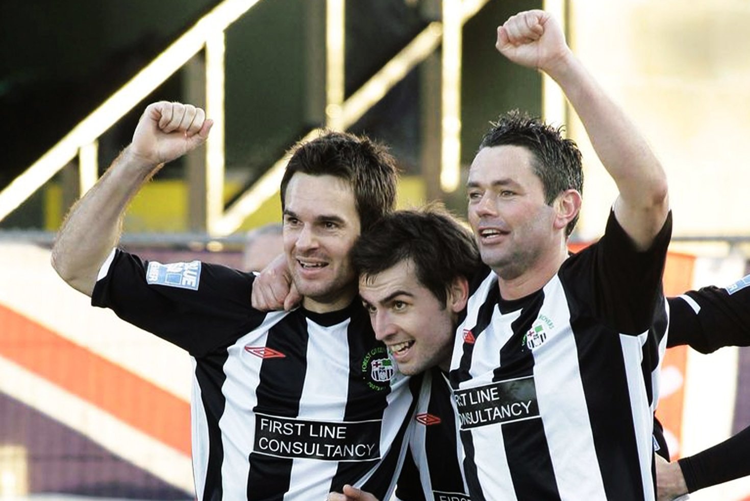 Forest Green players celebrate scoring against Derby