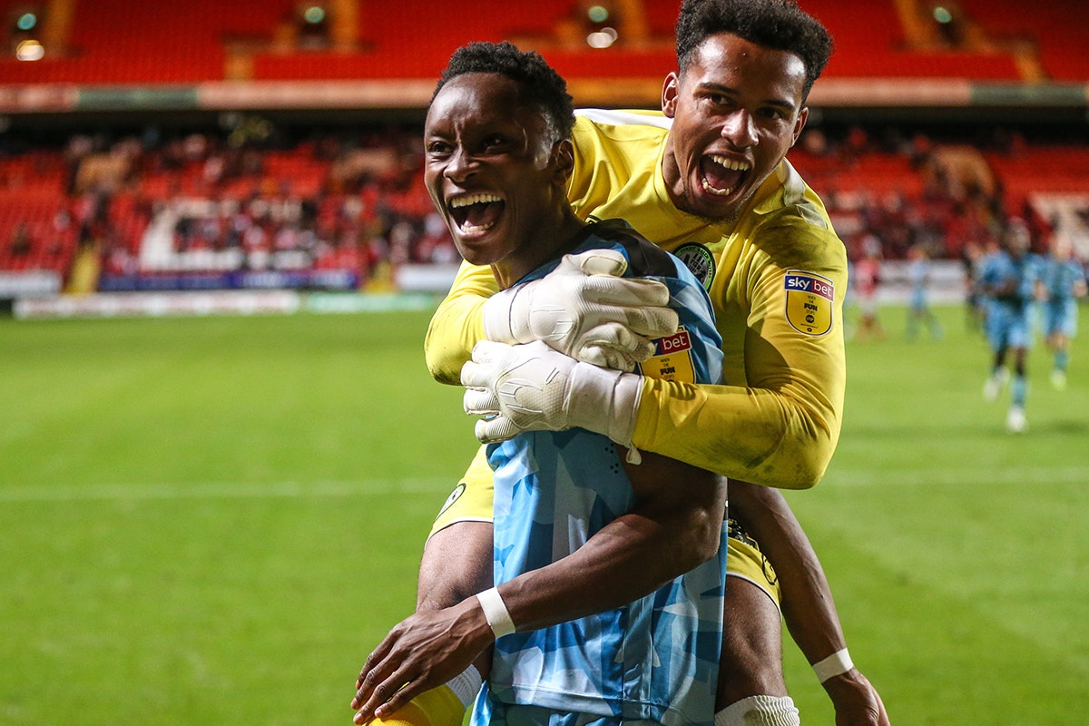Jojo Wollacott and Shawn McCoulsky celebrate beating Charlton Athletic in the Carabao Cup, 5-4 on penalties. 13 August 2019