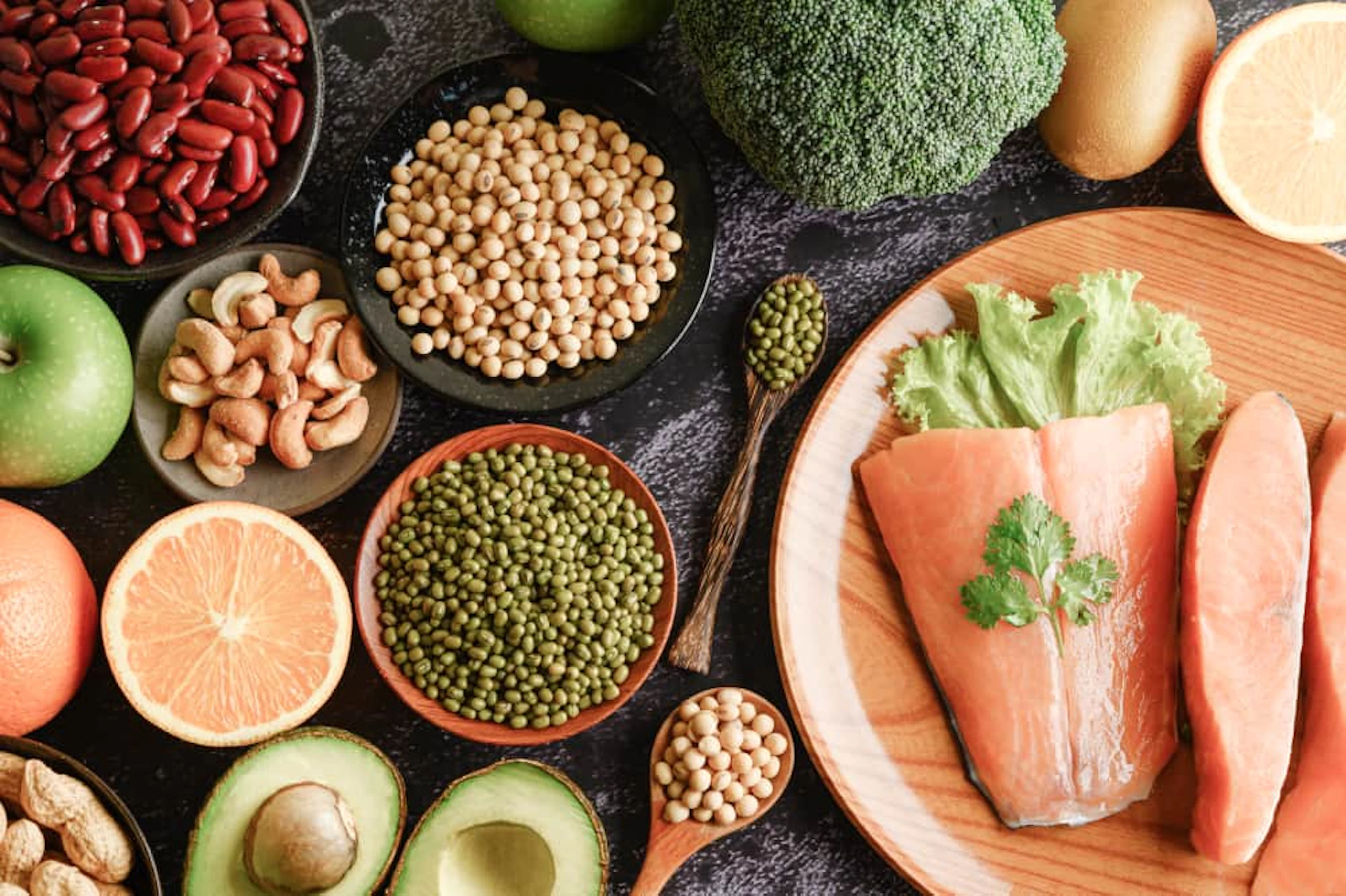 legumes fruit salmon pieces wooden plate 1