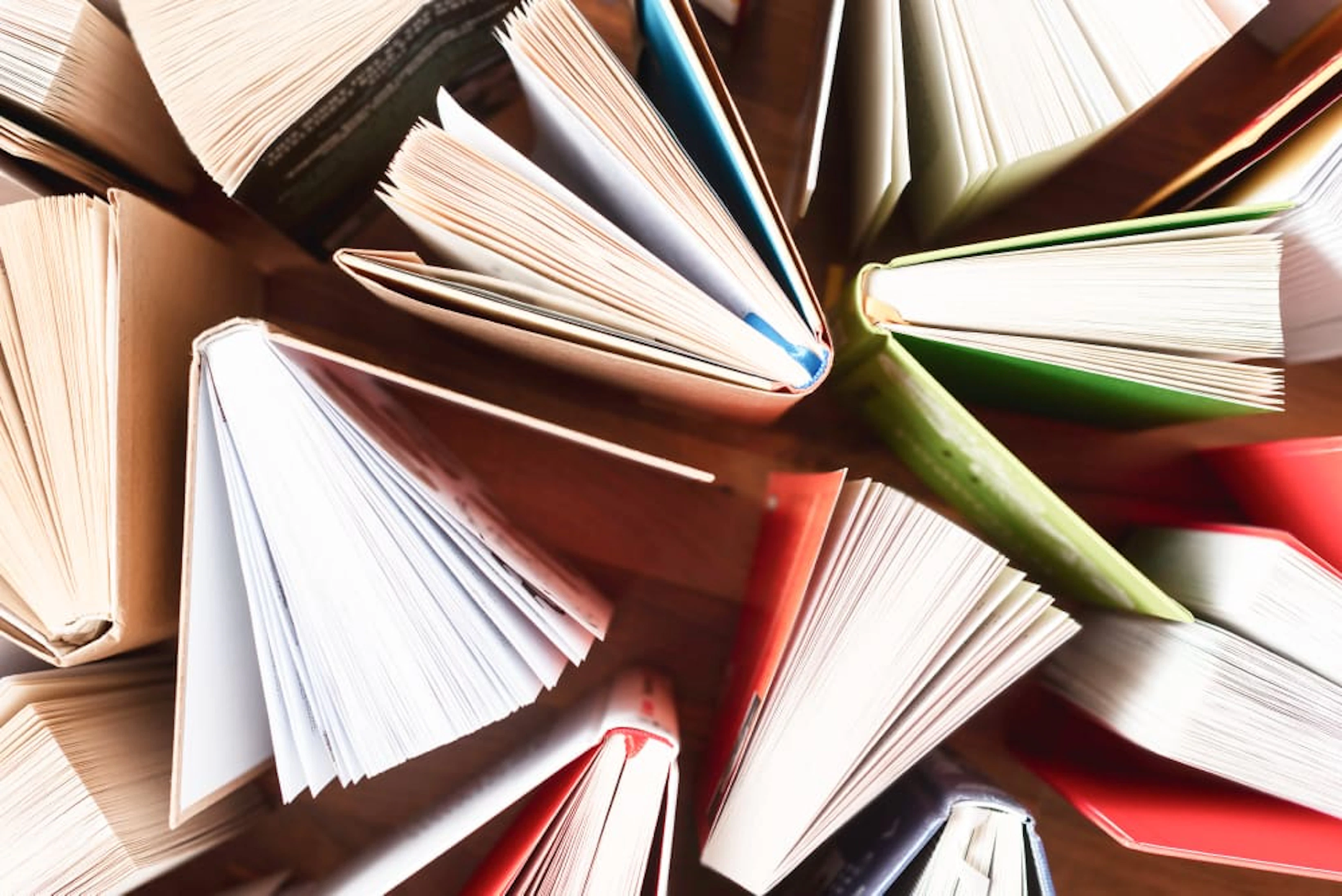 flat lay opened books table 1