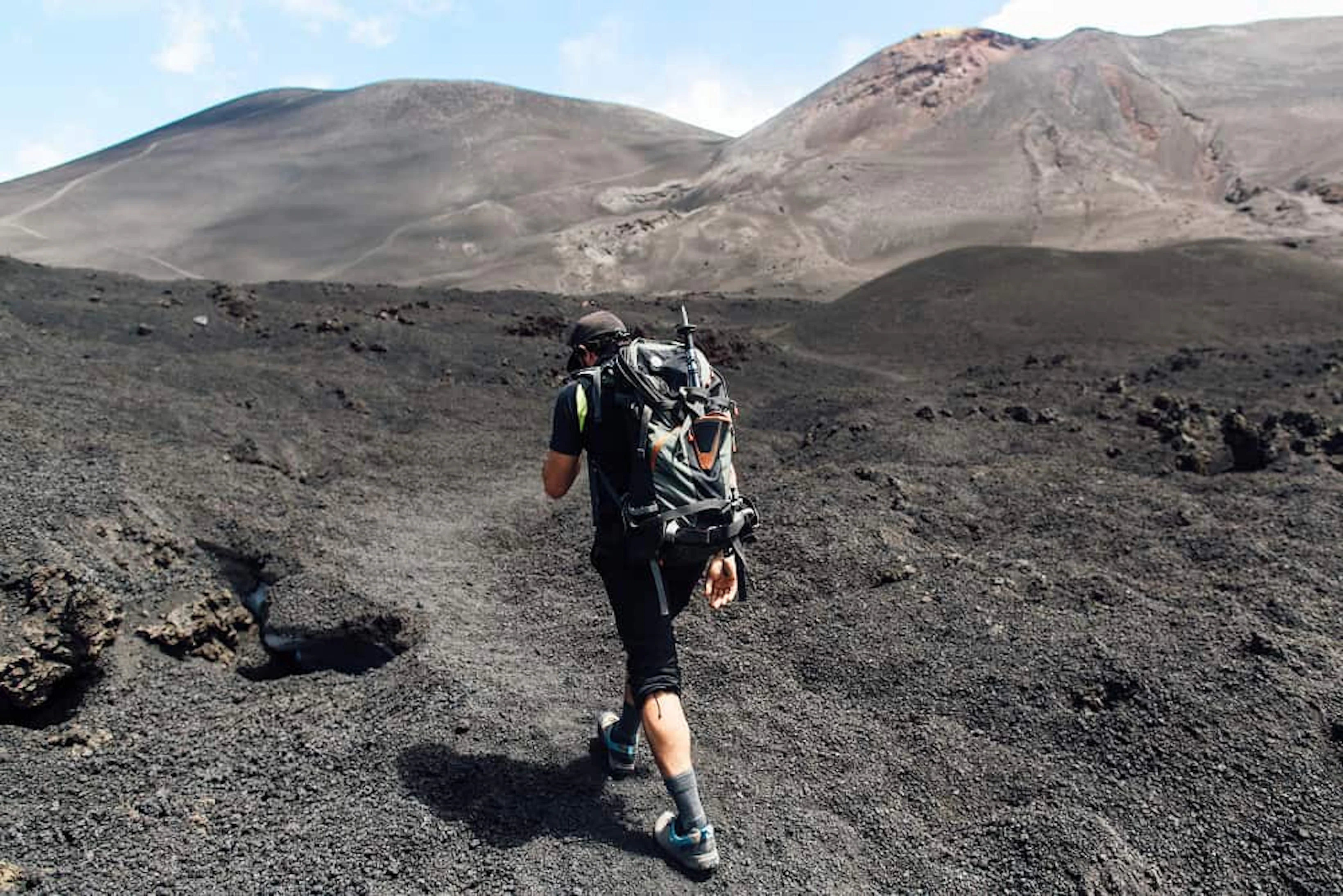 trekking peak volcano hiker climbing crater volcano etna sicily 1