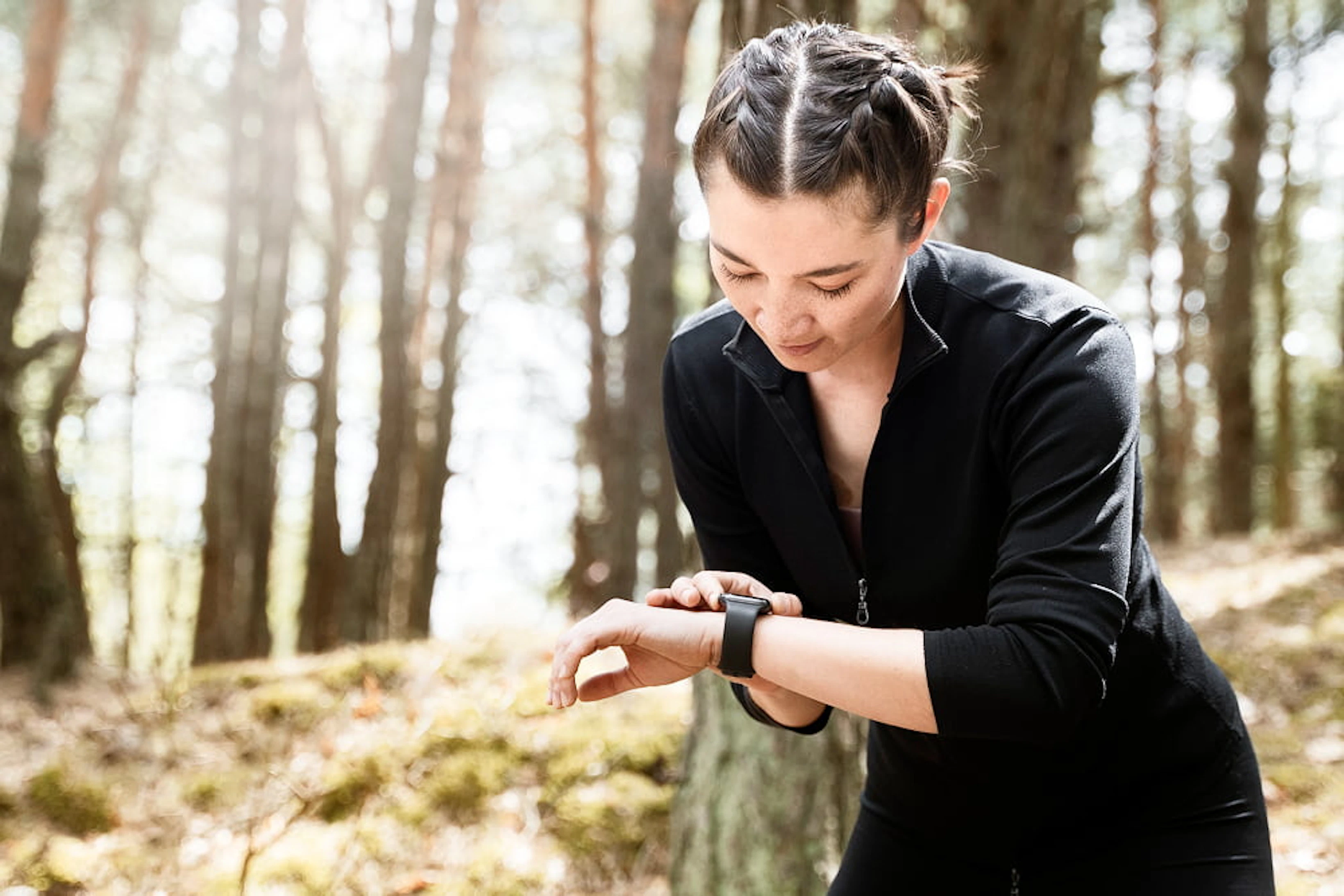 medium shot woman checking her watch 1