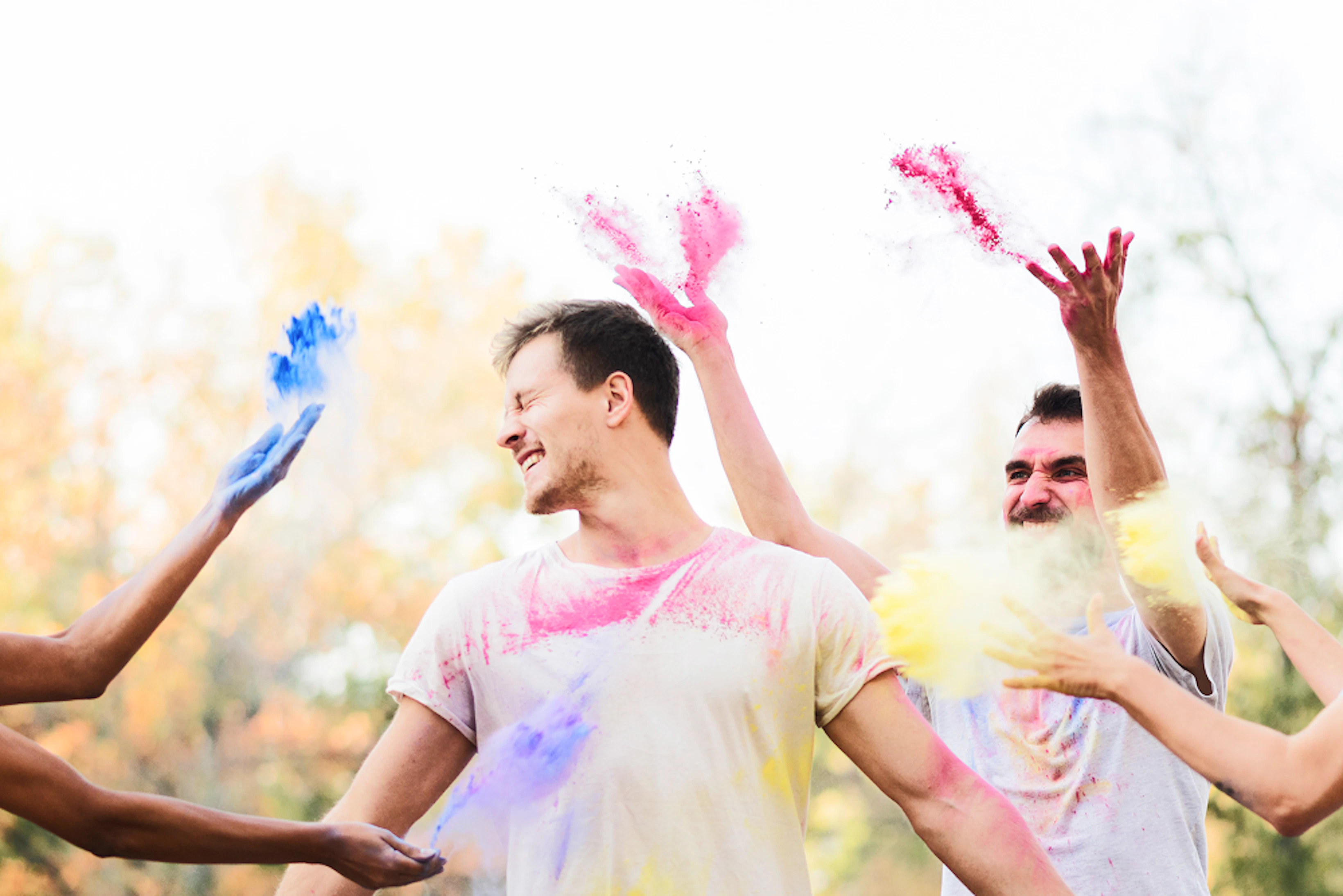 friends celebrating festival colors 1