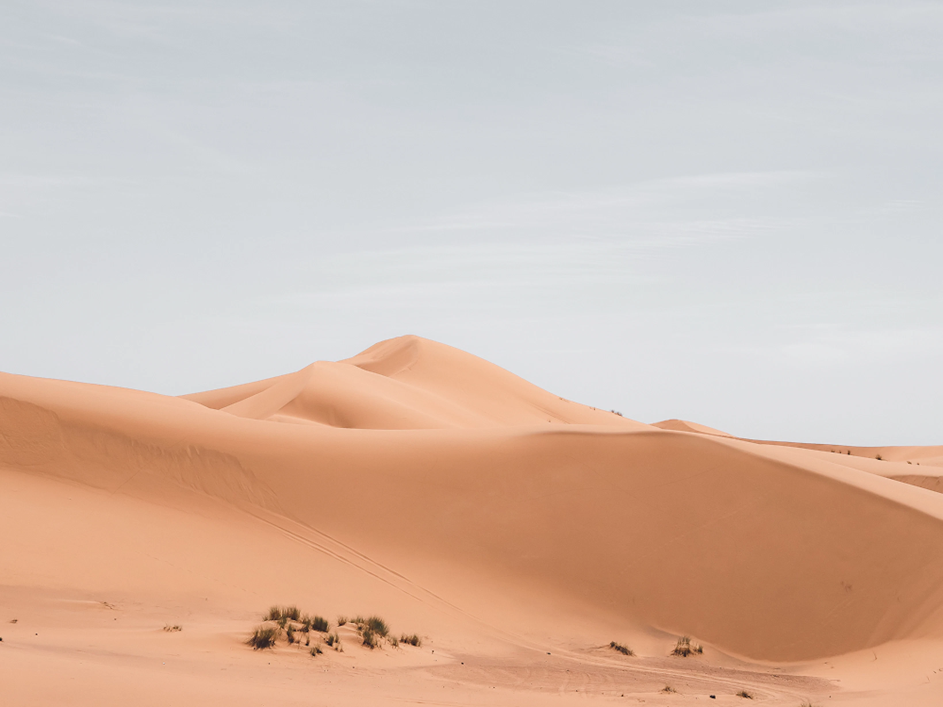 beautiful shot sand dunes with cloudy sky background 1