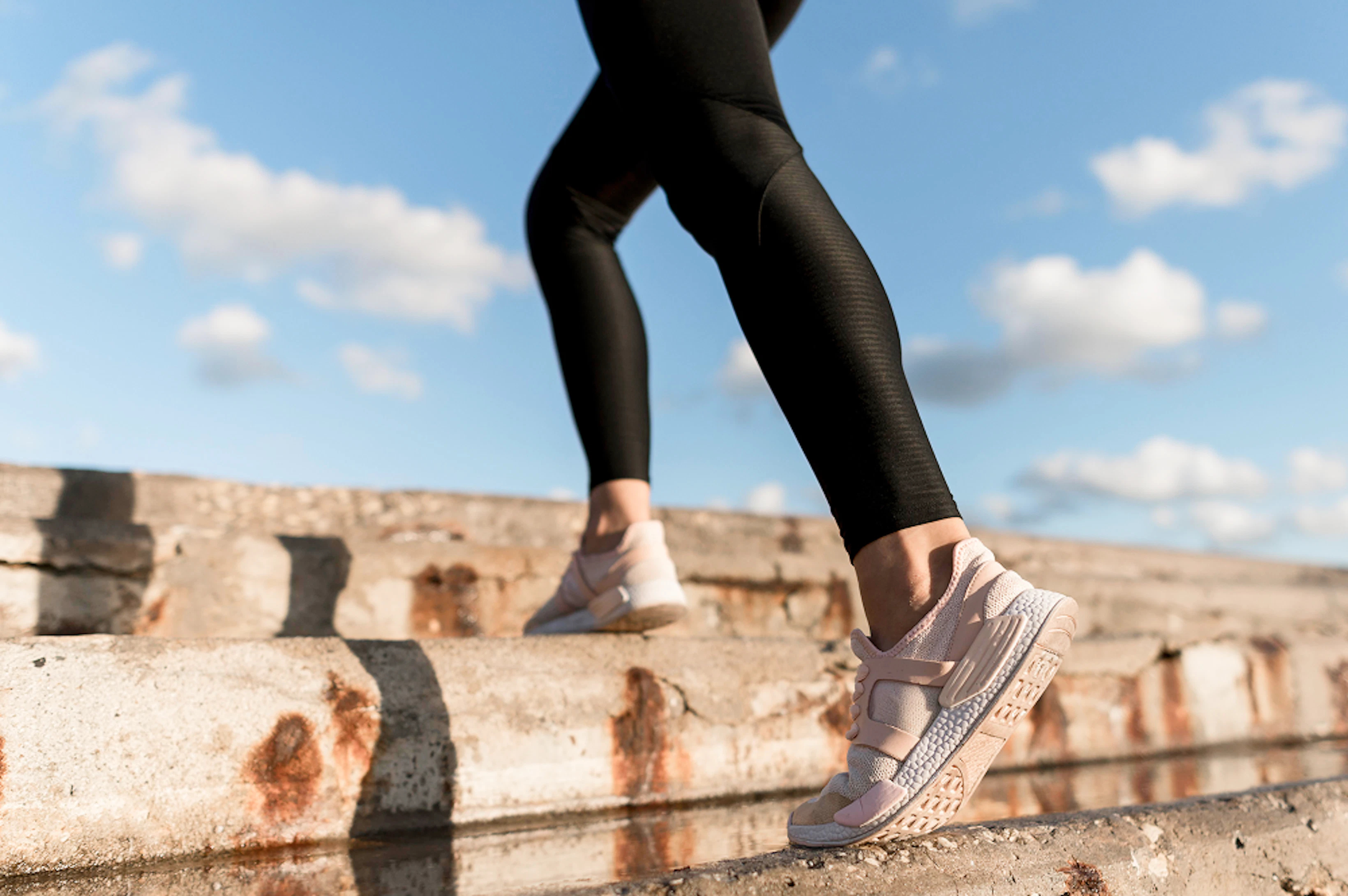 woman jogging stairs close up 1