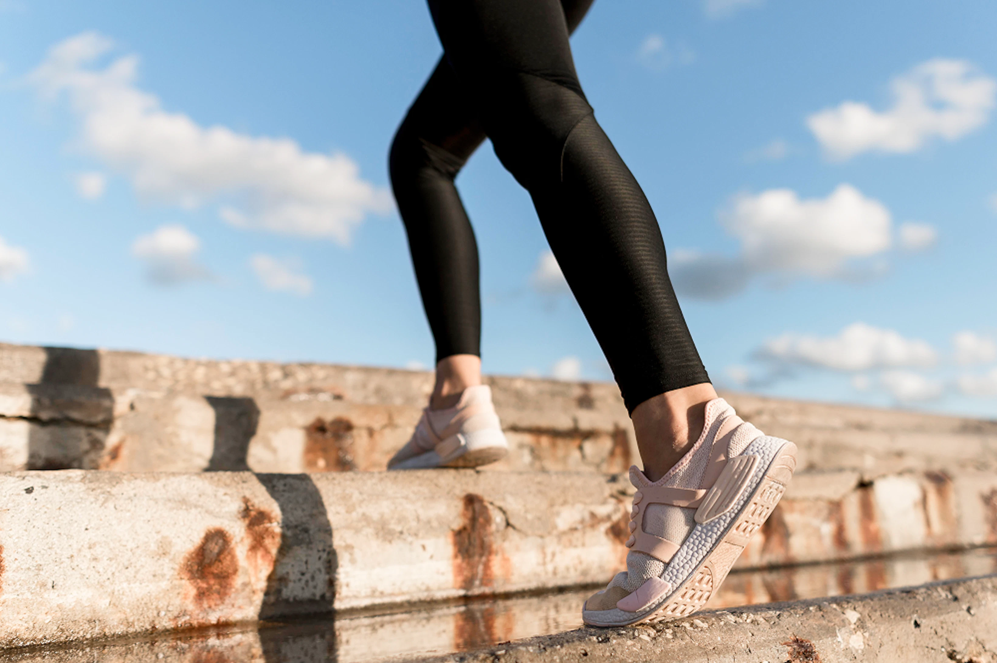woman jogging stairs close up 1
