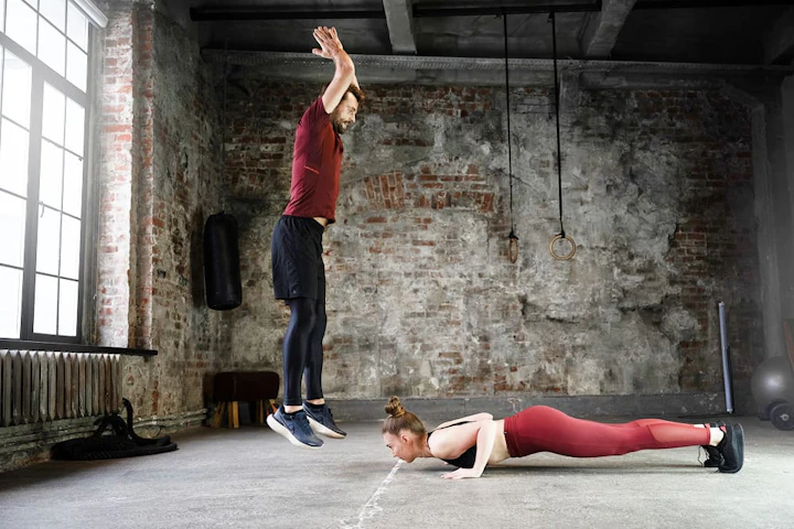 full shot fit people doing exercises together 1