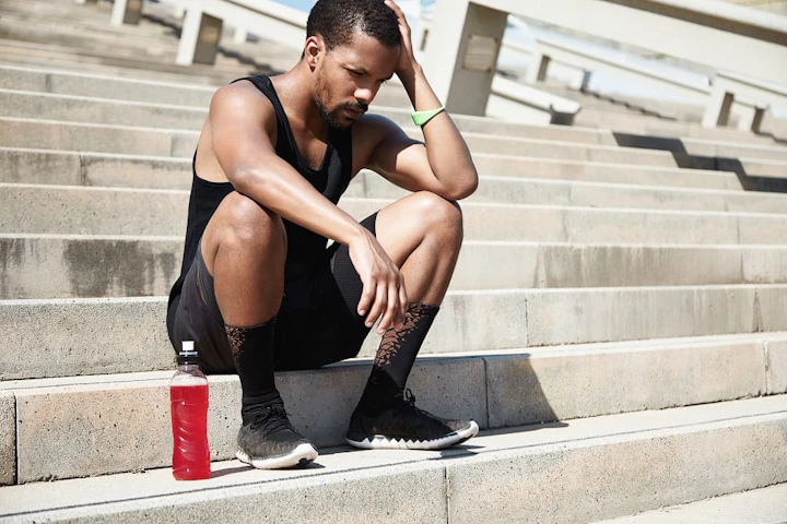 young man resting after exercising 1