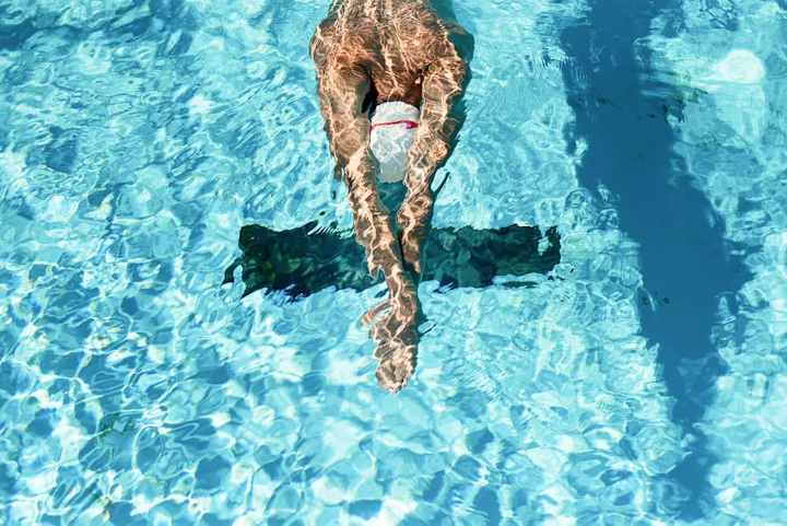 high angle male swimmer water pool 1