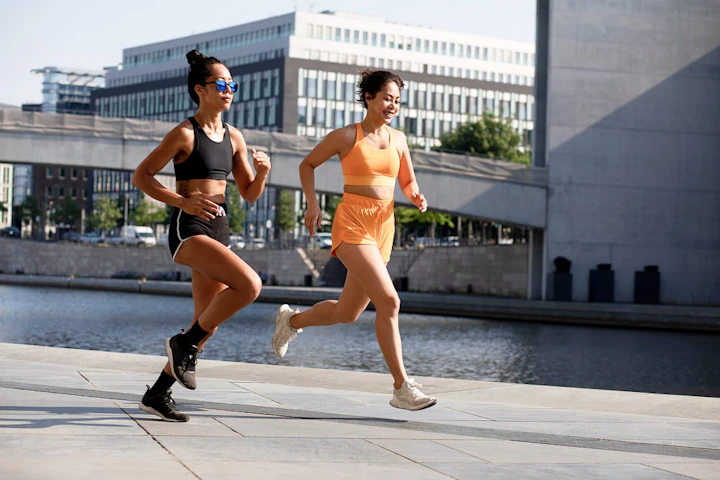 women running together full shot 1