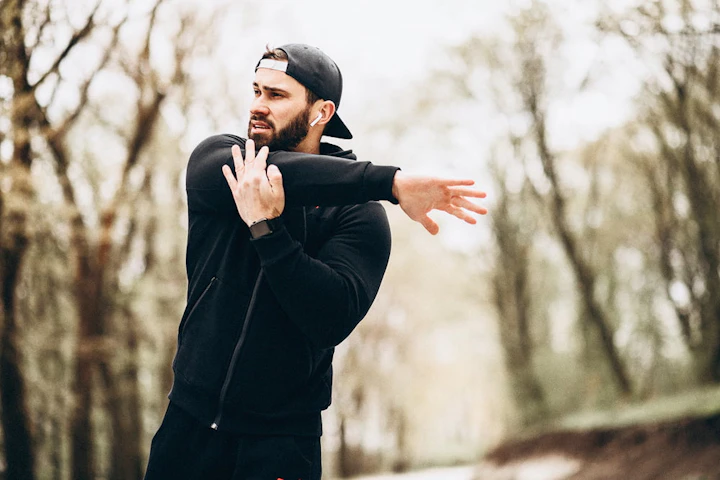 handsome man exercising park sports wear 1