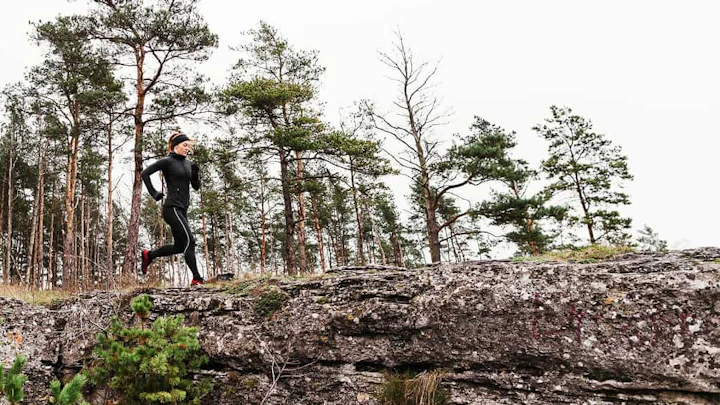 female jogger running daylight long shot 1