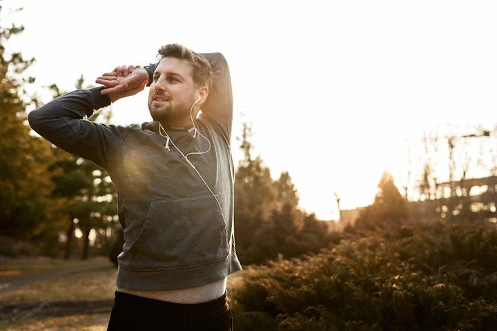 young man exercising outdoors park 1