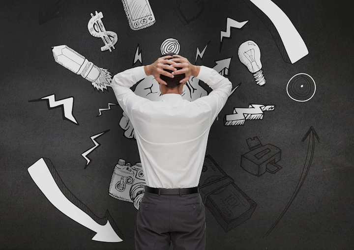 homme en costume stressé avec des dessins stressant autour