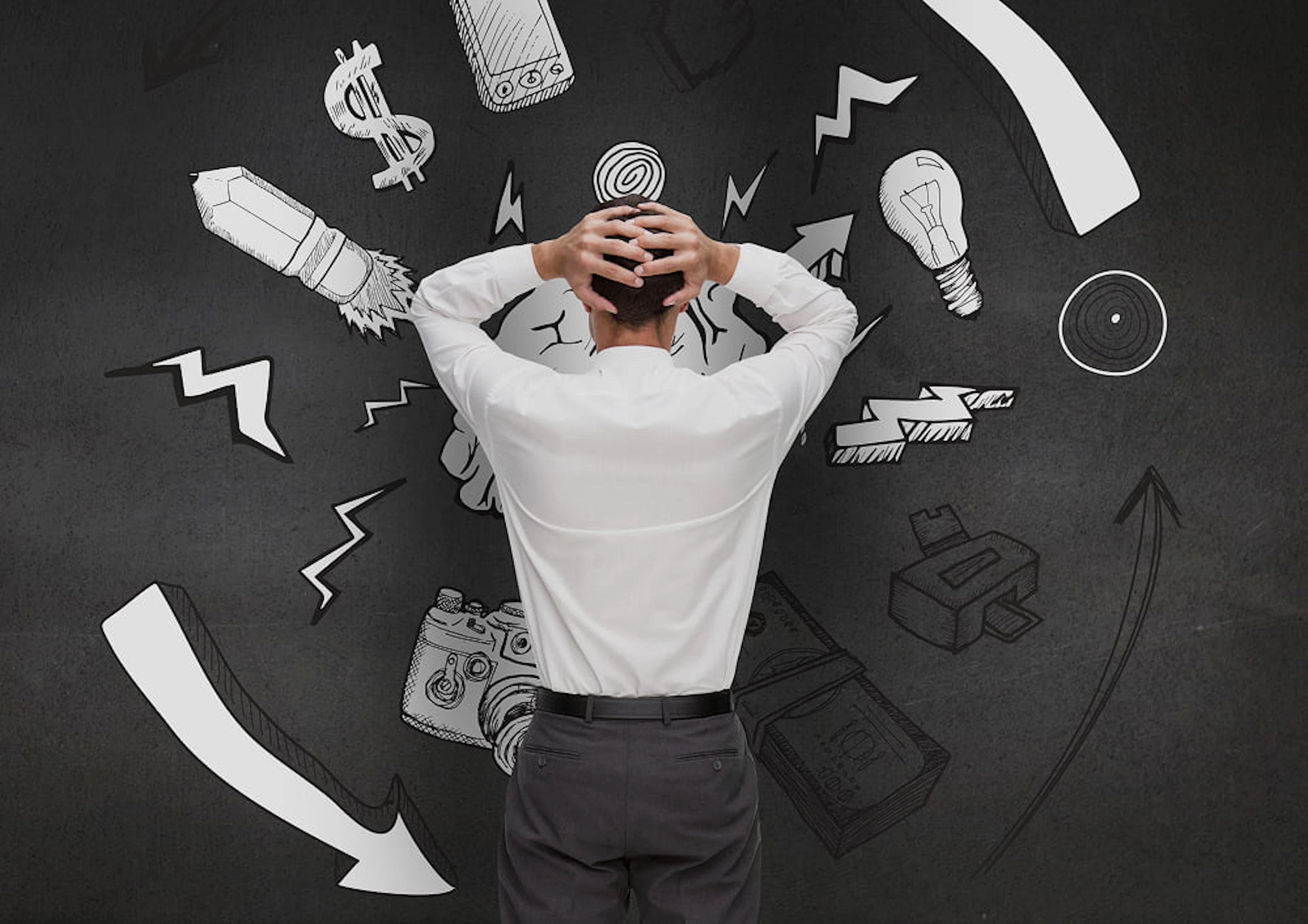 homme en costume stressé avec des dessins stressant autour