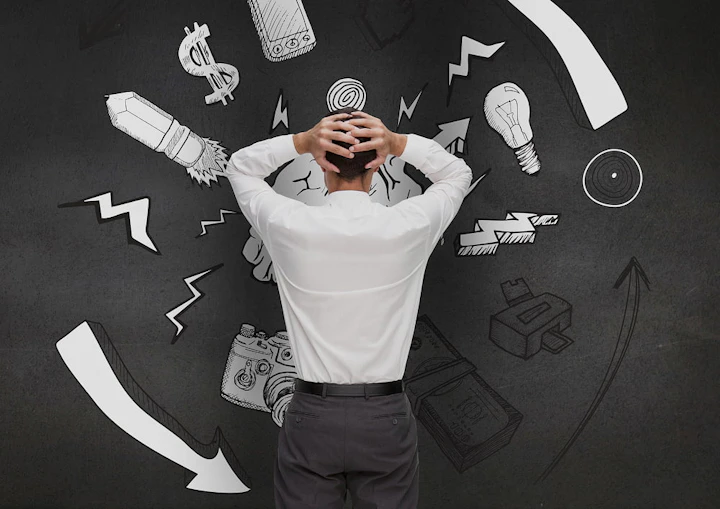 homme en costume stressé avec des dessins stressant autour