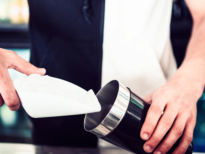 barman filling shaker with ice 1 1