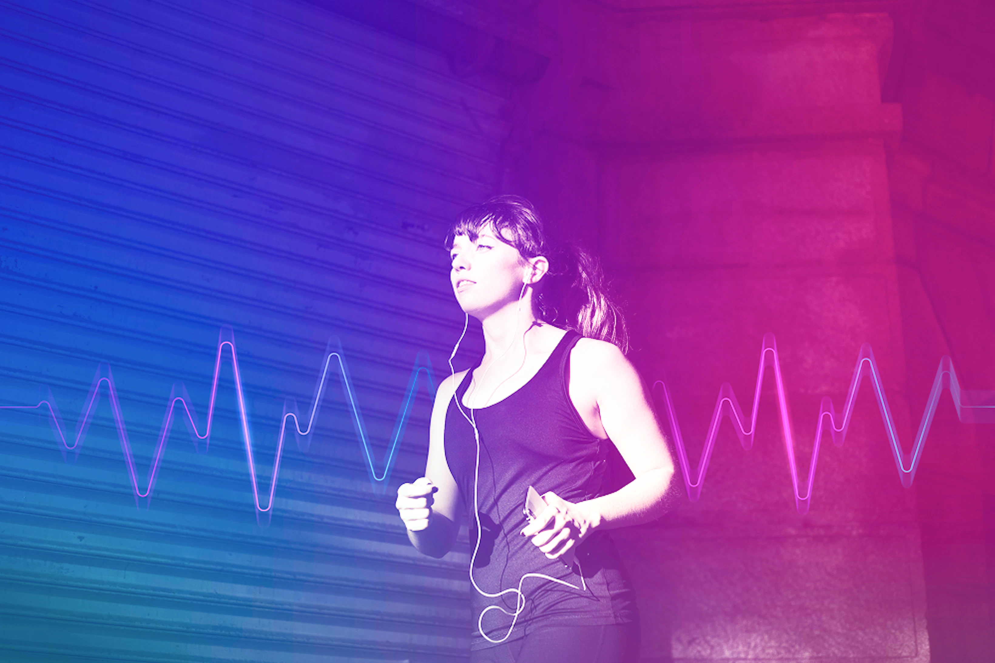 femme cardio ecouteurs