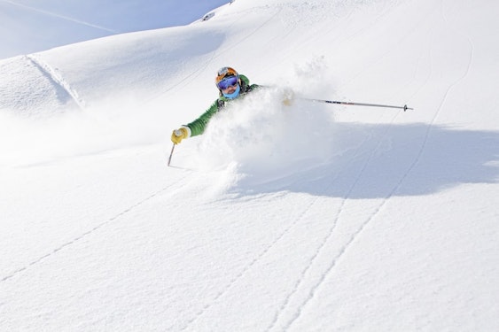 Skier on the slopes of Areches-Beaufort in Savoie, ski resort in the Beaufortain massif