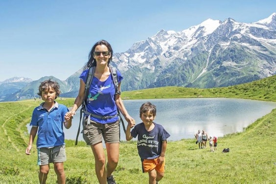Family hiking with children at Les Contamines-Montjoie in summer, Haute-Savoie