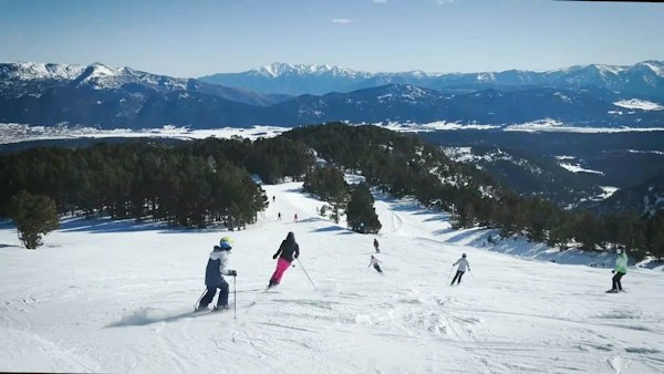 Groomed run and chairlift on the Formiguères ski area, Pyrénées-Orientales