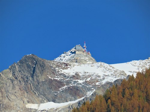 The Aiguille des Grands Montets above Argentière, with the reconstruction site cranes, November 2024