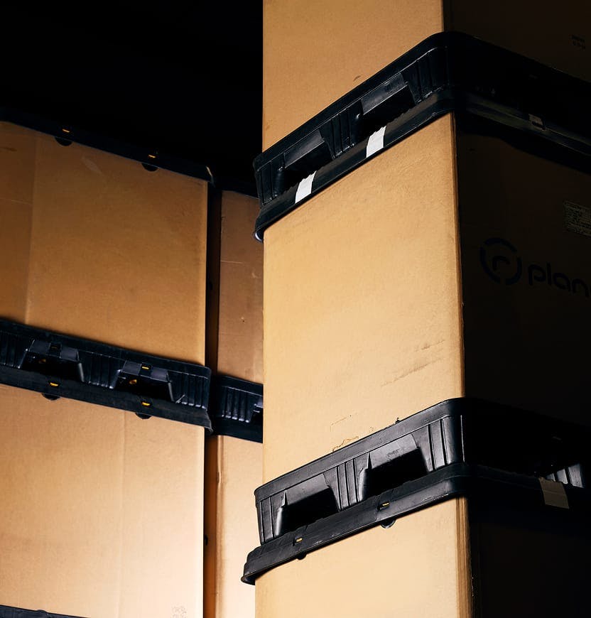 stacked pallets of boxes