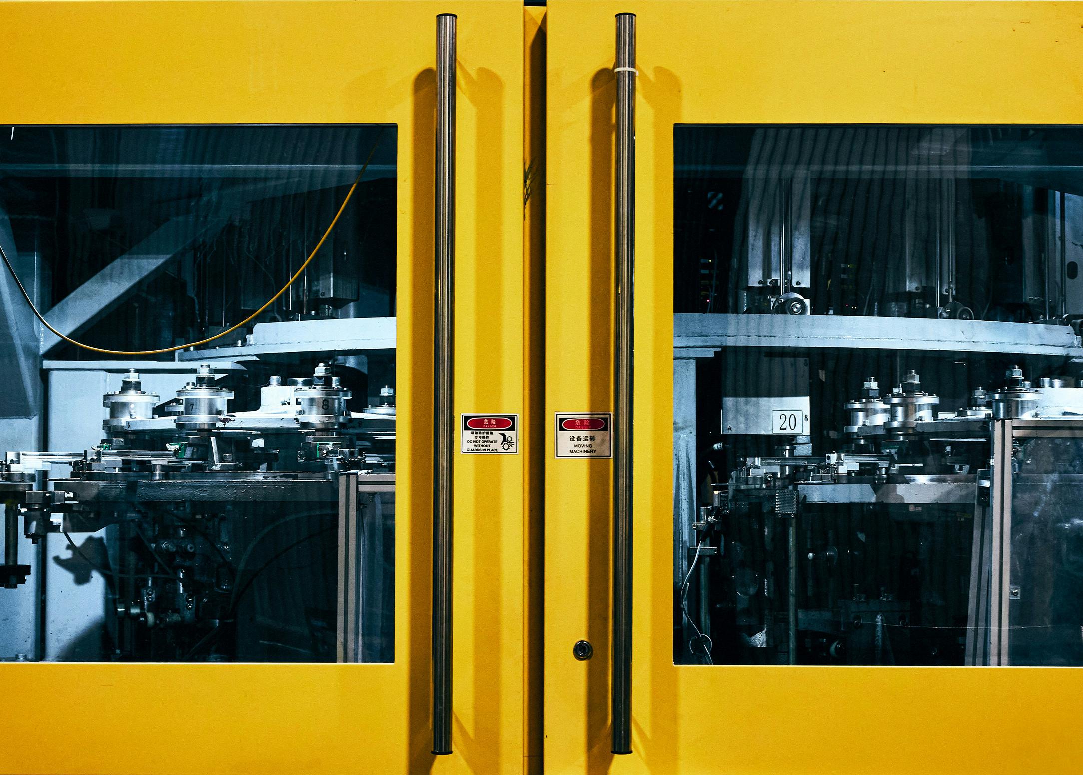 alcohol bottling with two yellow doors