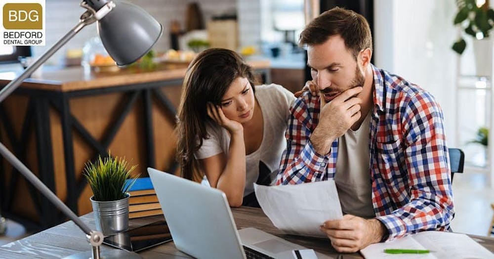 couple looking at paperwork