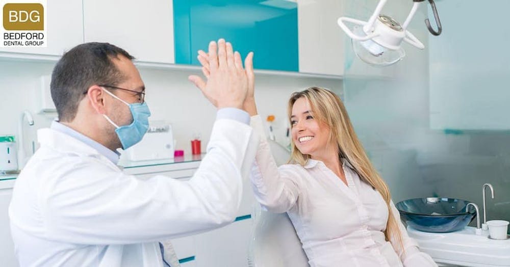dentist giving a patient a high five