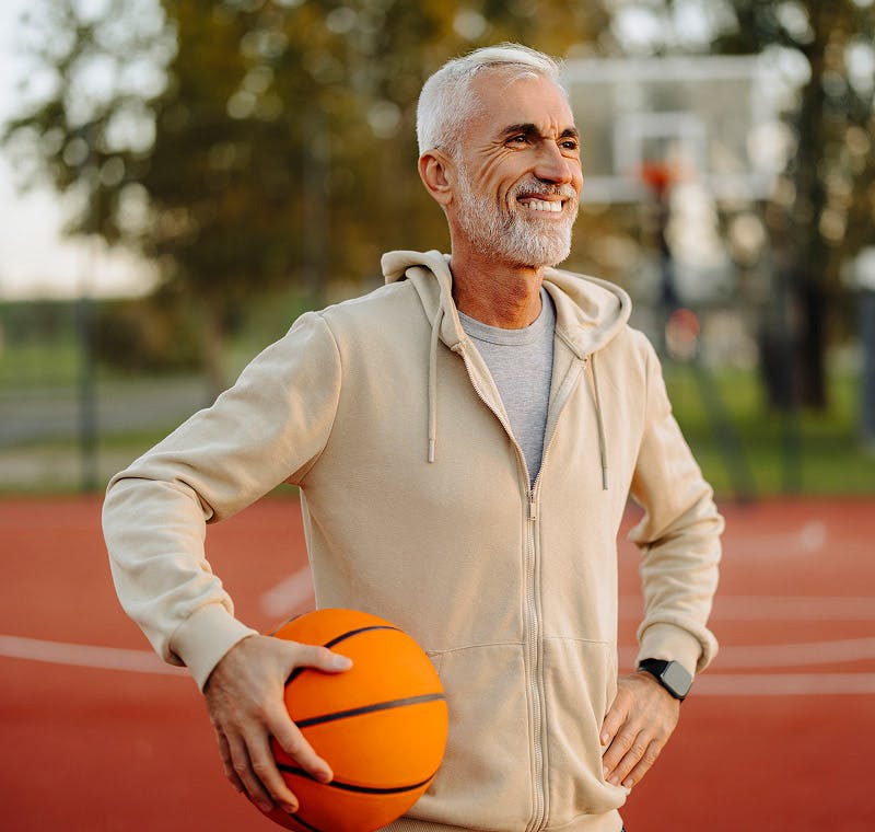 man playing basketball