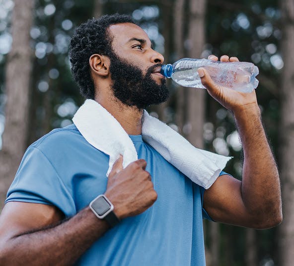 man drinking water