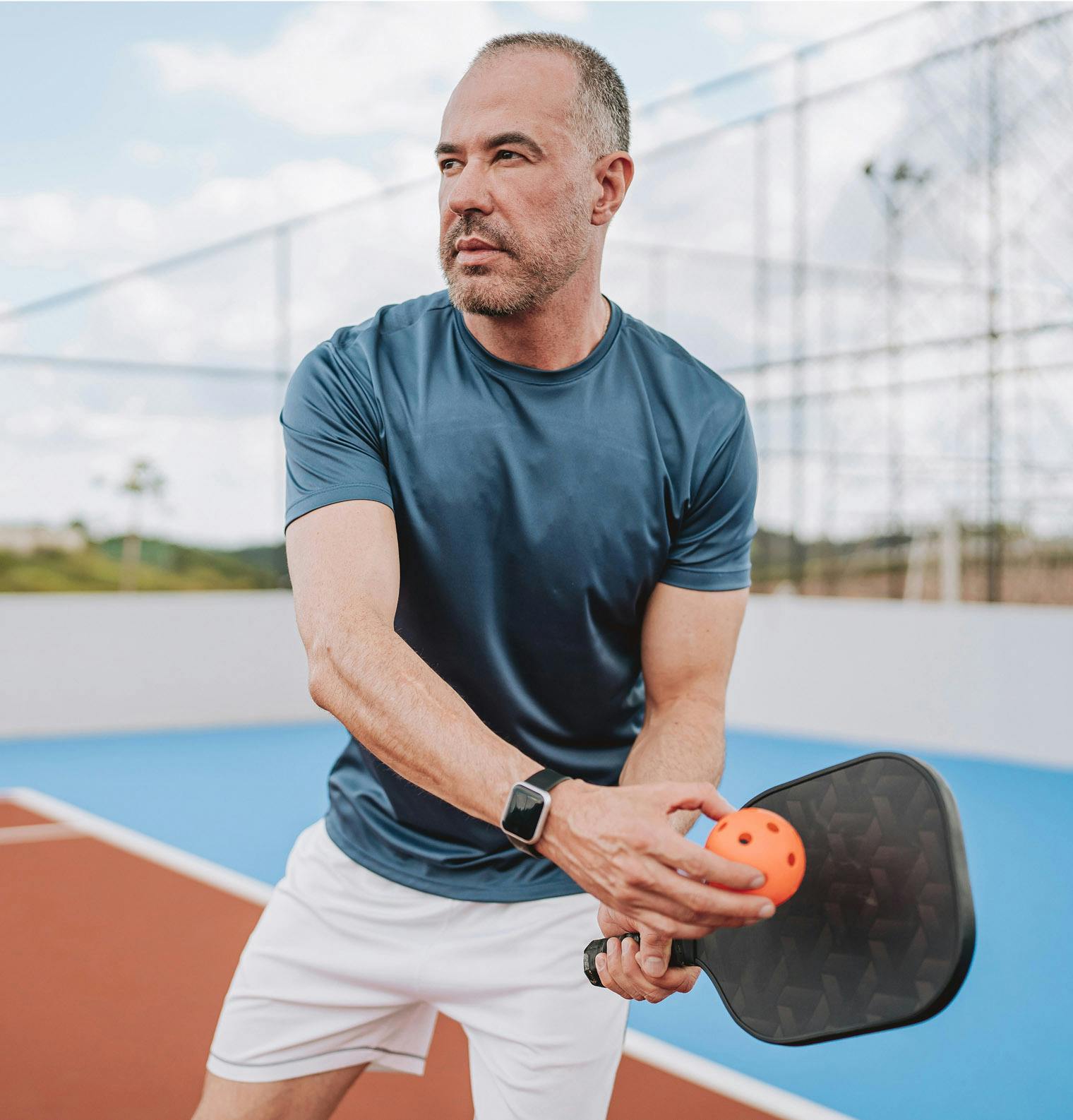 man playing pickleball