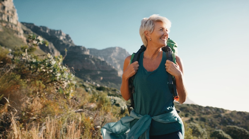 woman hiking and looking at the view