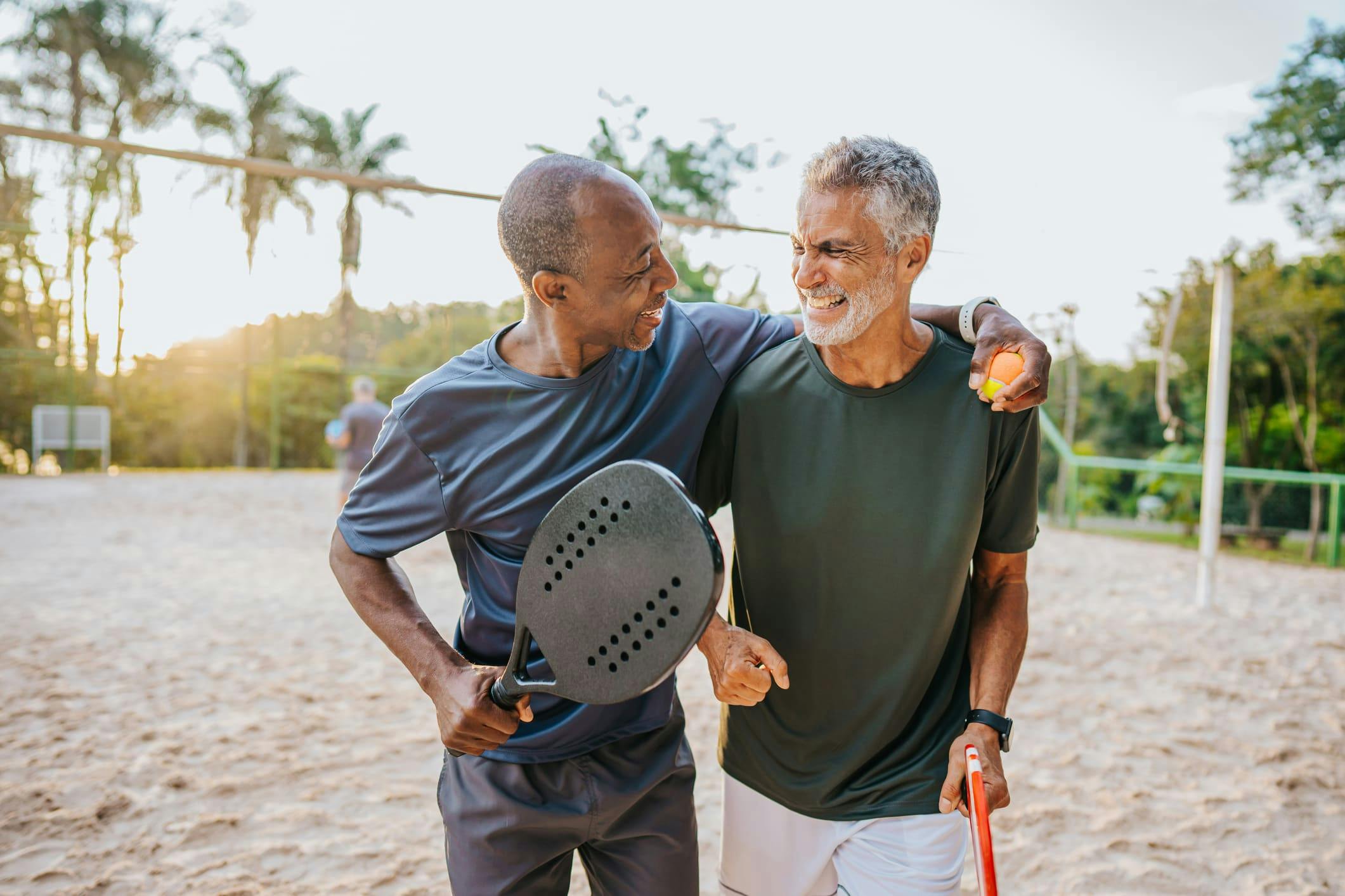 2 men playing tennis