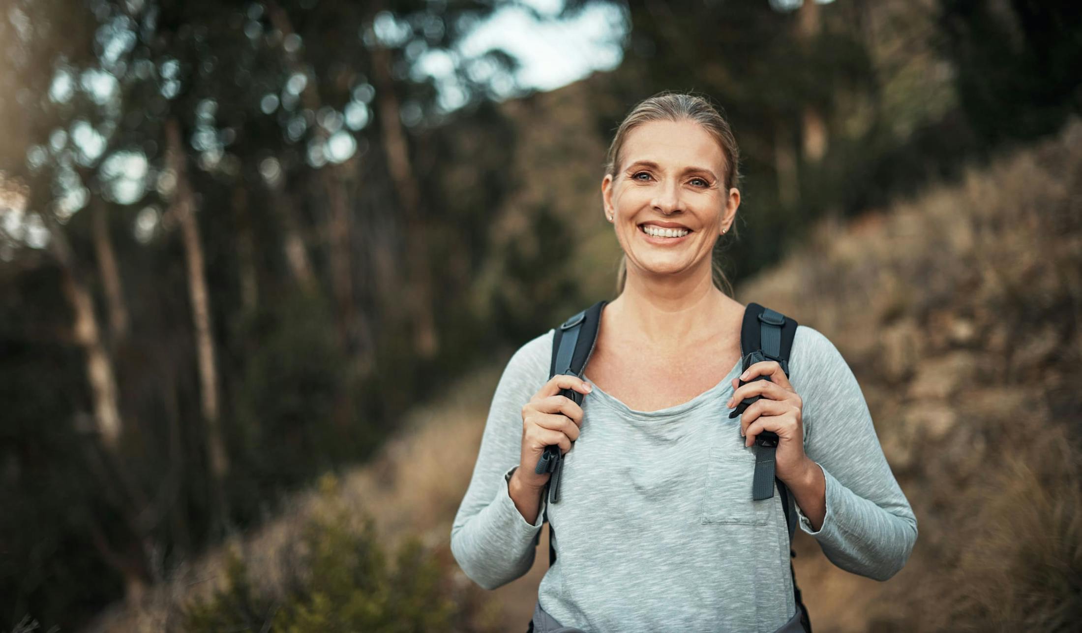 woman walking with a backpack on