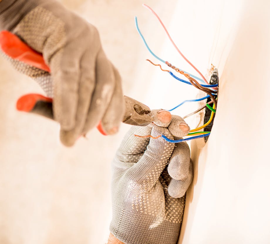 Electrician working on wiring