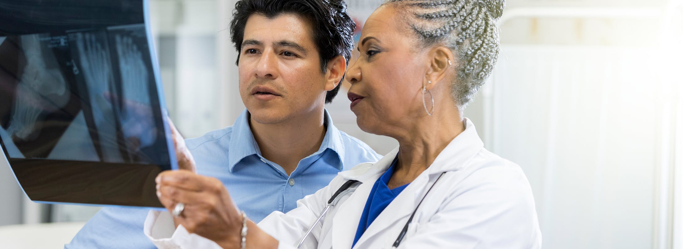 Doctor and patient looking at an x-ray