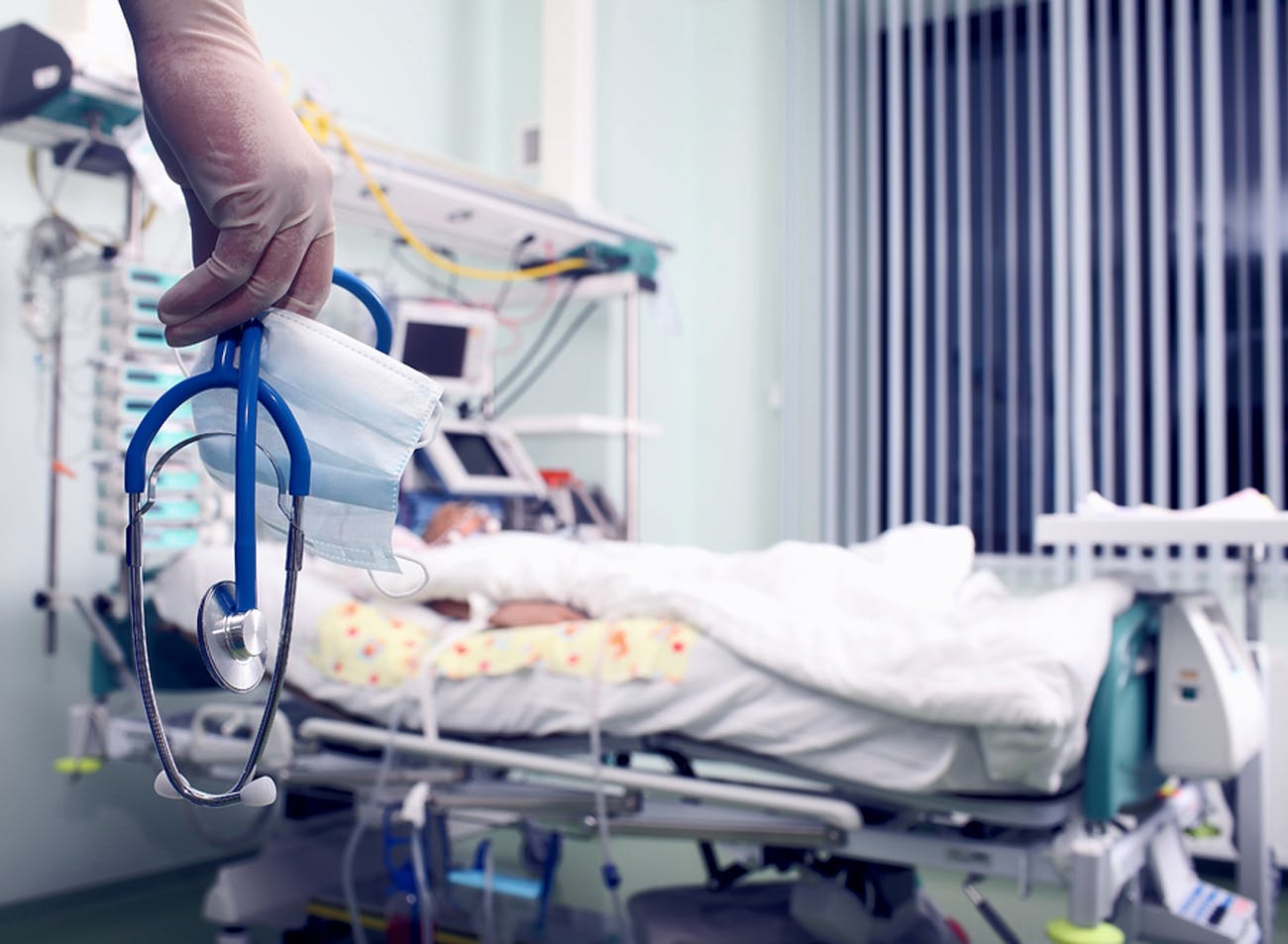 Worker walking into patients room