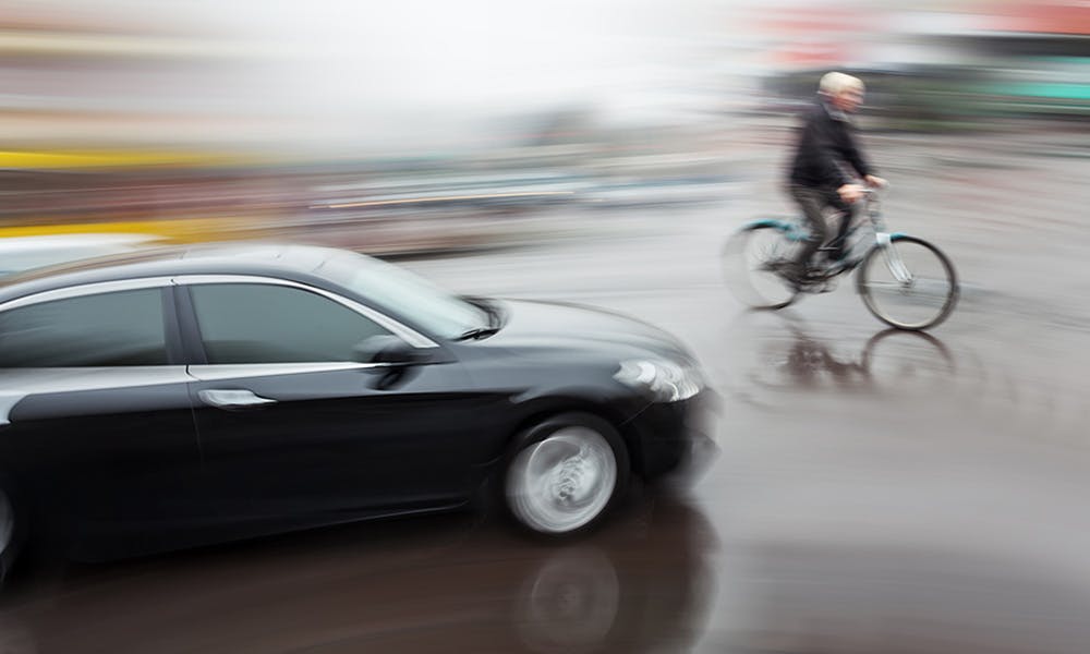 Car about to hit cyclist