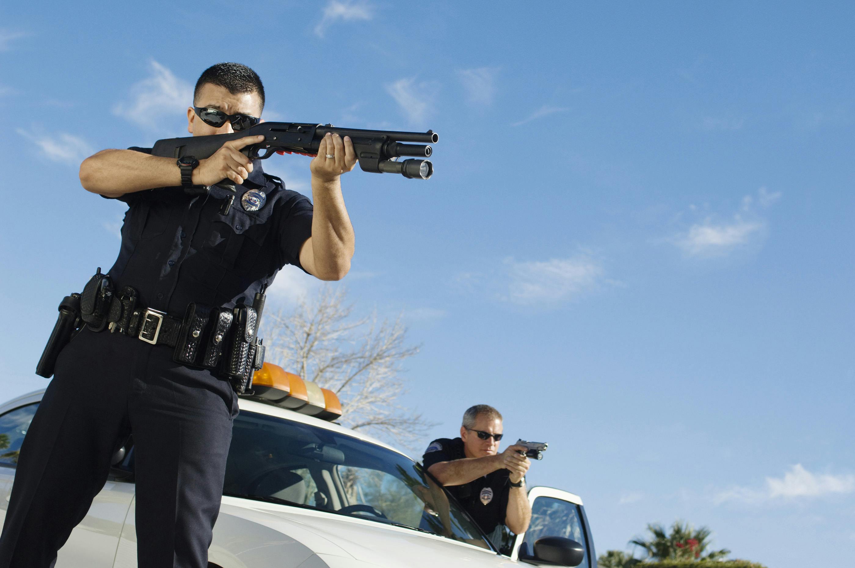 Officers with their firearms out