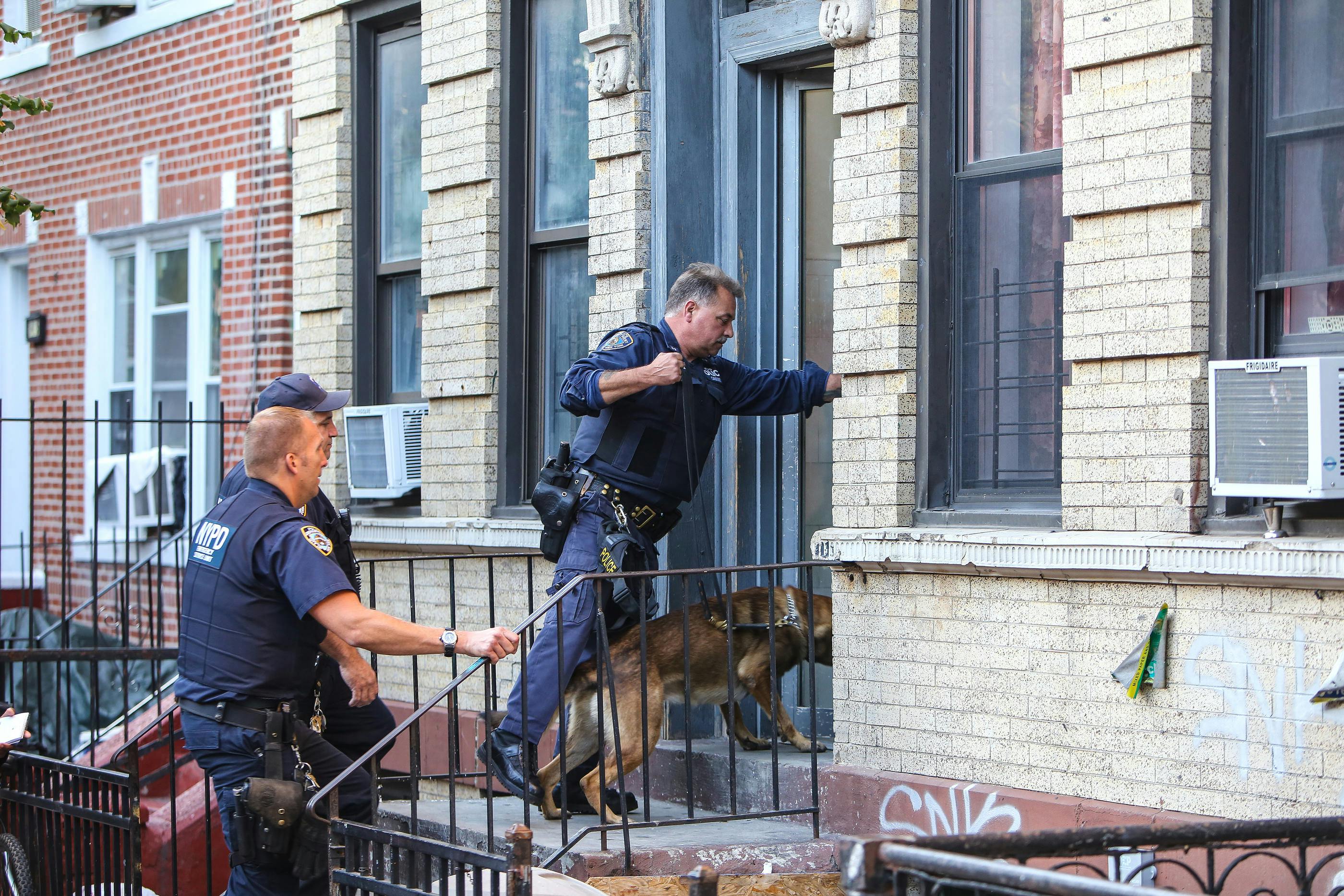 Police entering building