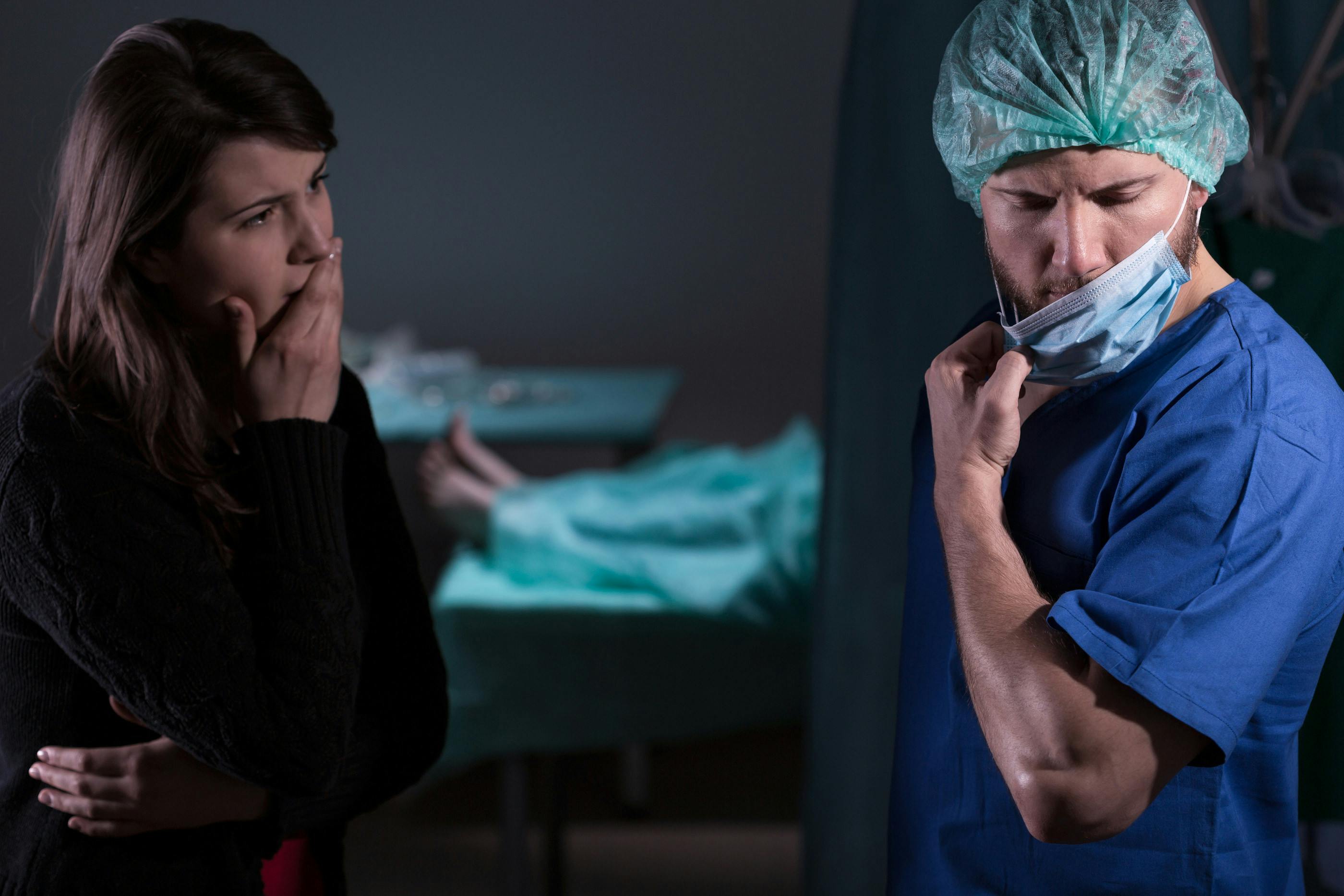 Woman speaking to doctor