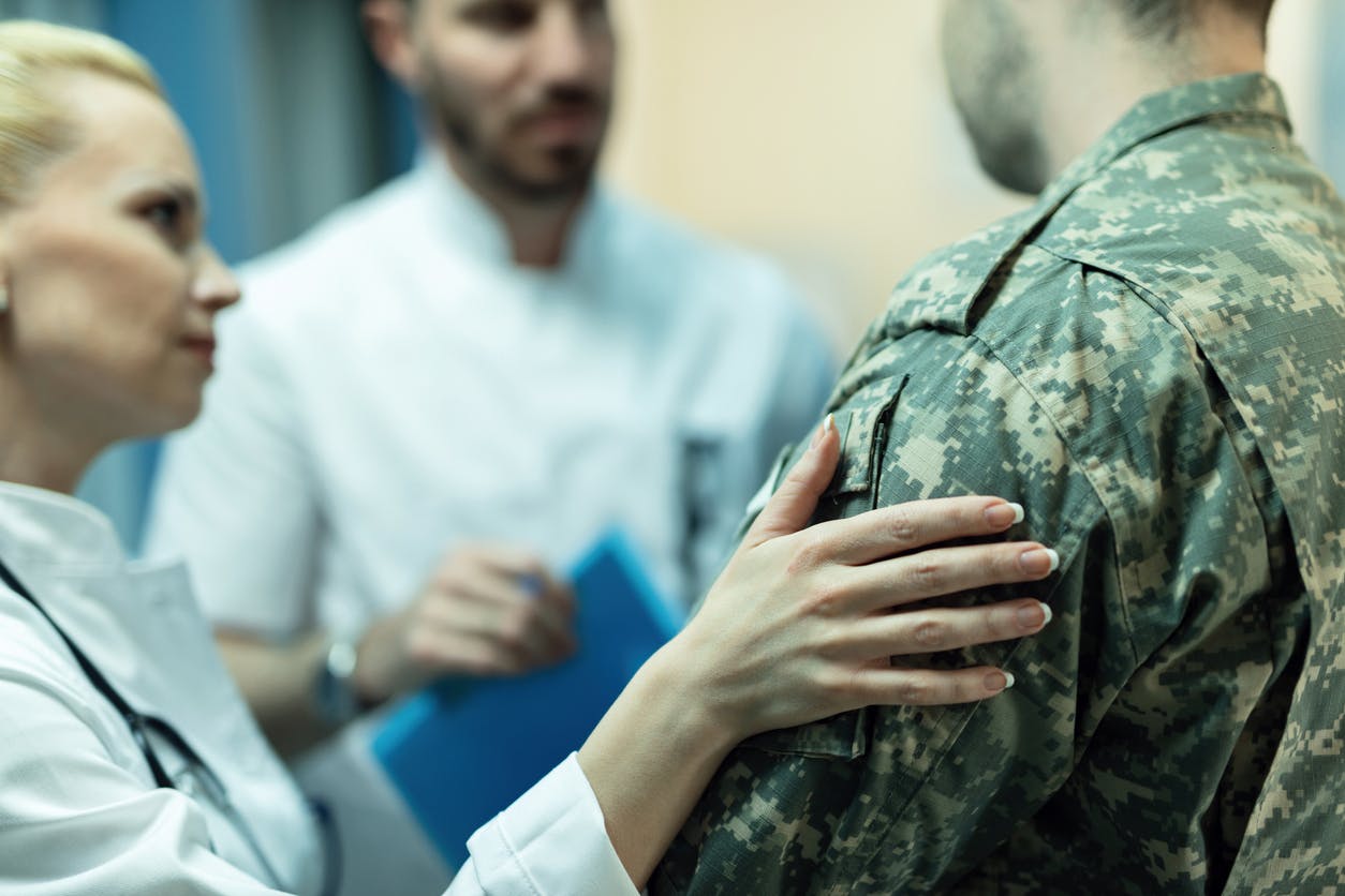 Doctor talking to a soldier