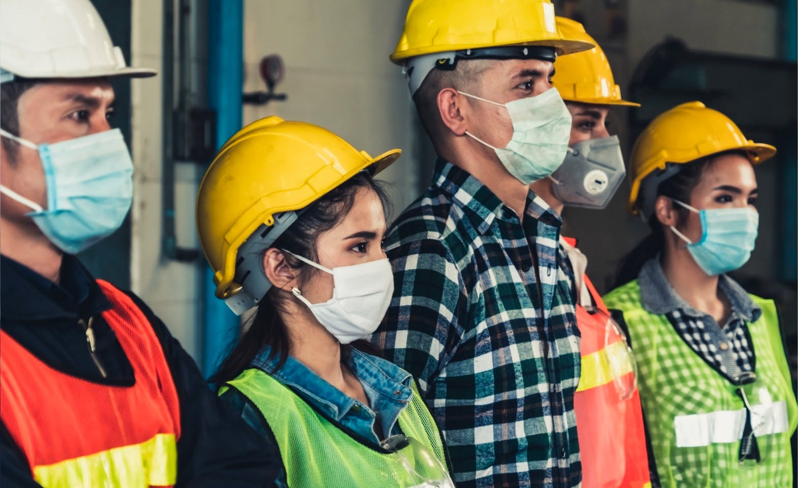 Constructions workers wearing masks