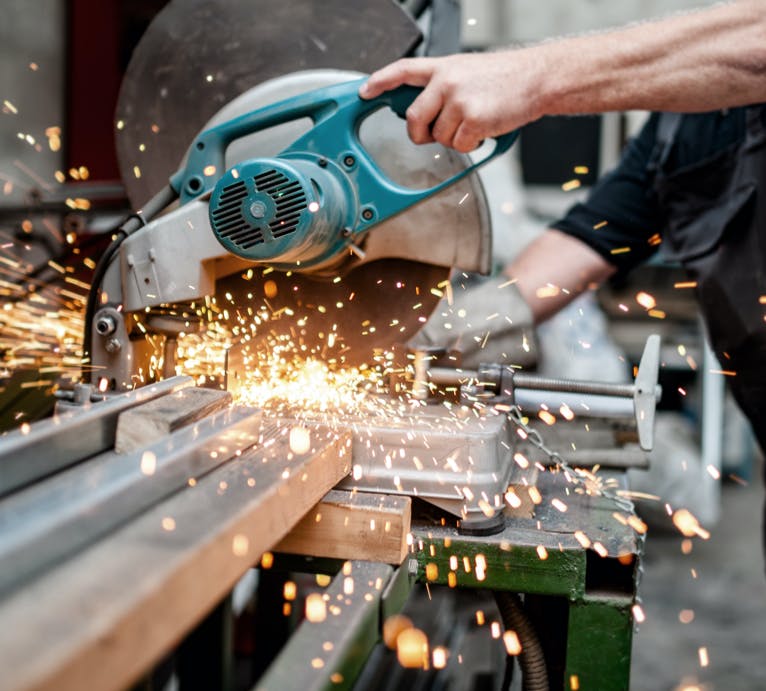 Person using electric saw