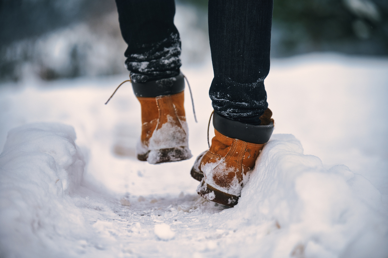 Snowy Slip and Fall Winter Accident - Boots Walking On Snow