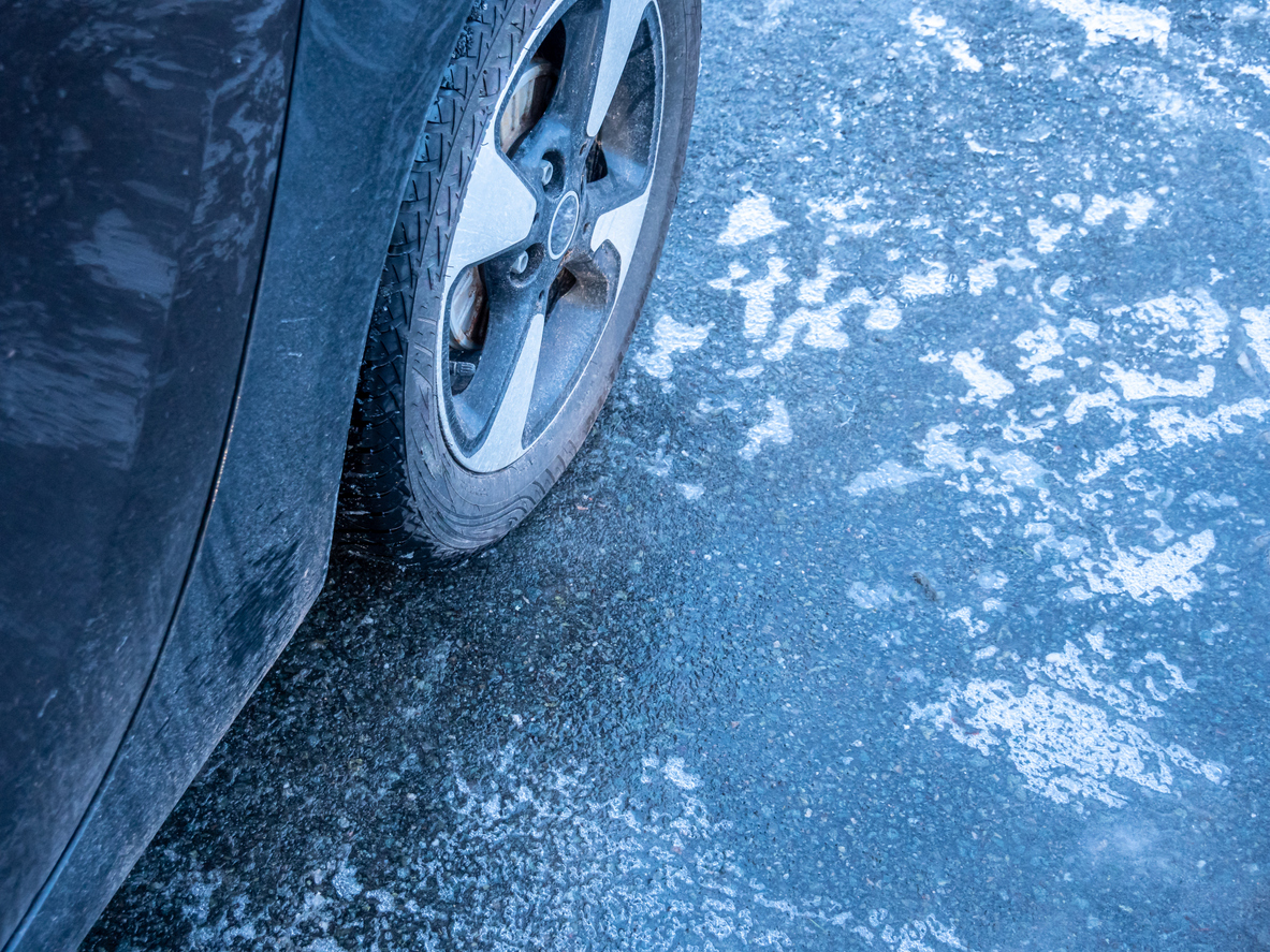 Car wheel on black ice