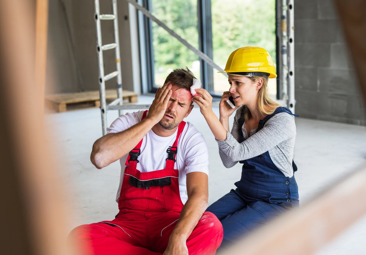 Man getting help with injured head.