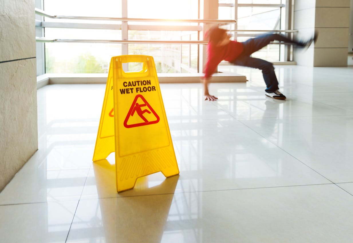 Man slipping on a wet floor